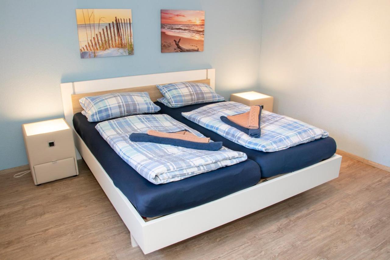 Haus Polarstern Ferienwohnung Jupiter บอร์คุม ภายนอก รูปภาพ